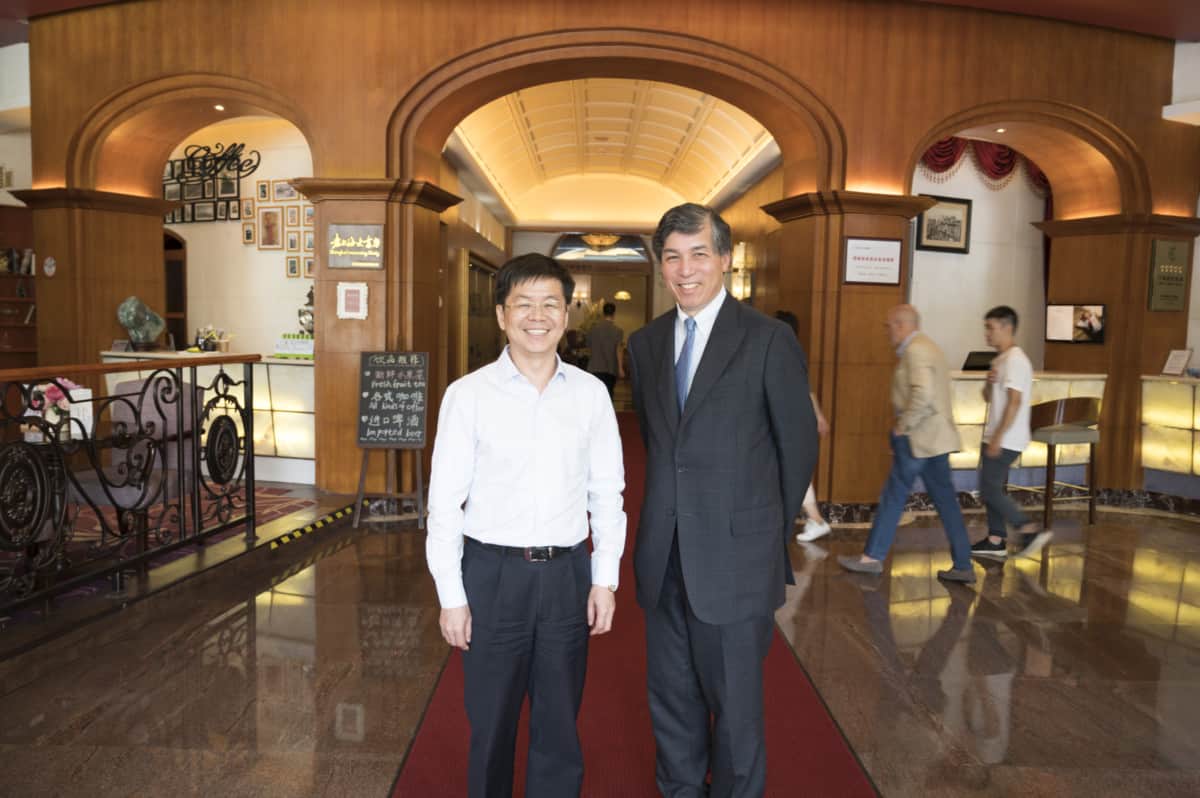 Willy Shih (right) with Feng Xiangyang, the director of the Shenzhen Futian Enterprise Development Service Center in China in August 2019. 