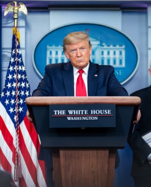 President Trump at the White House press briefing podium. Trump said on Fox News he was "looking" into whether Chinese companies hoping to list in the U.S. should be forced to comply with U.S. accounting standards.