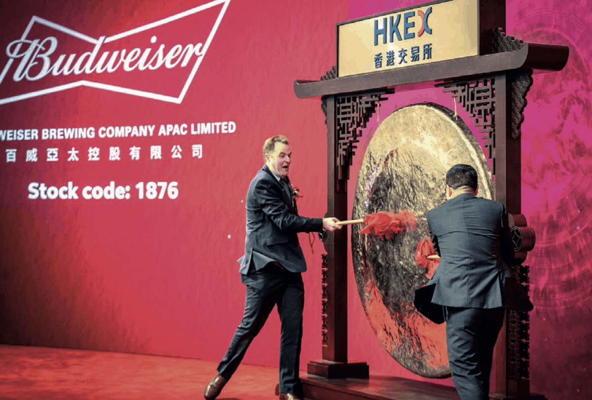 Budweisers's Jan Craps hits gong at HKEX listing ceremony